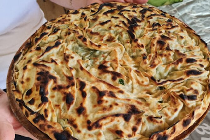 Tirana Guided Street Food Gems Tour (6 dishes, 1 sweet and drink) - Pispili Near Parliament and the Tanners’ Bridge