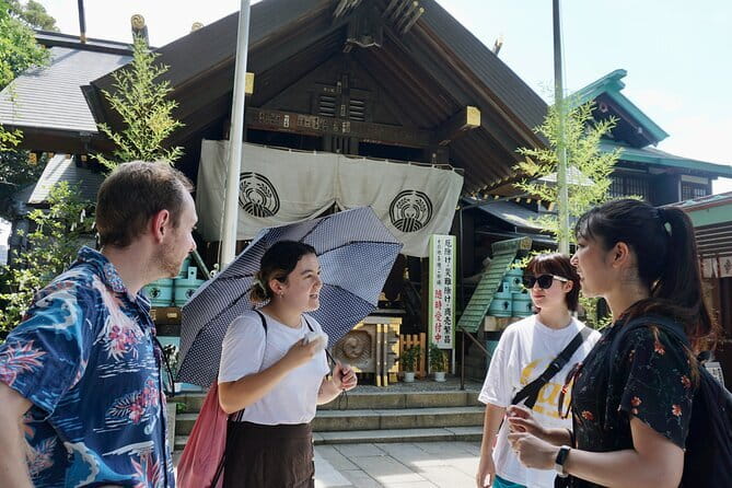 Tokyo Fish Market Food Tour: Street Food & Friendly Guide - A small welcome with sake