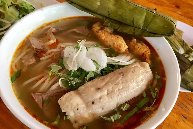 Top Notch Street Food Motorbike Tour In Ho Chi Minh City - Ban Co Market and southern beef stew
