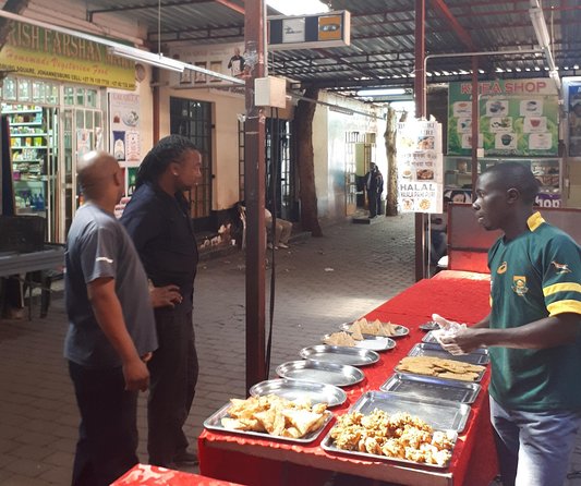 Unique street food tour from at least 6 different cultures! - Tasting Indian and Pakistani food in the market