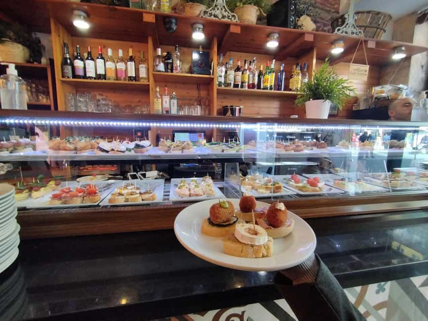 Valencia: Street Food Tour including Paella & Tapas Tasting - Mercado Central in a 40-minute food stop